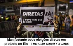 Manifestante pede eleies diretas em protesto no Rio - Foto: Guito Moreto / O Globo